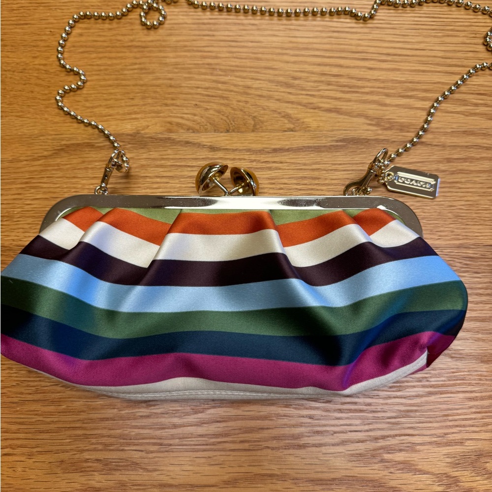 Coach multi color clutch/purse